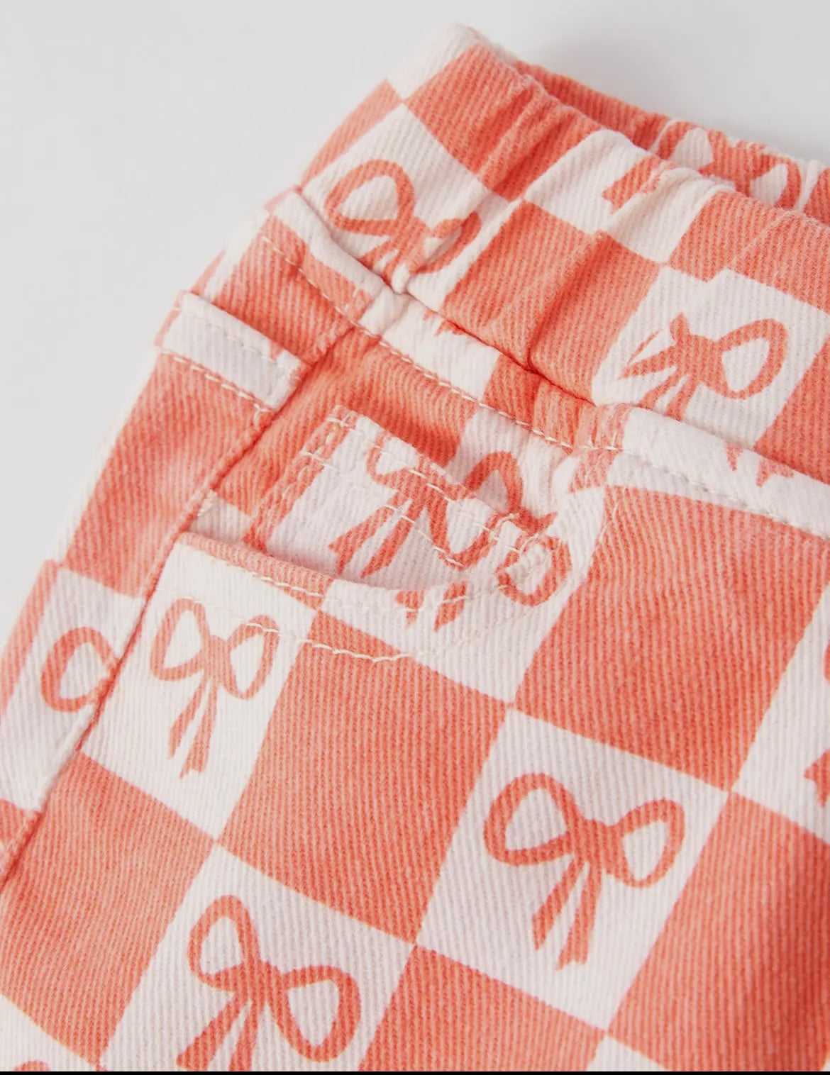 Girls Orange Bow Print Plaid Flares Jeans