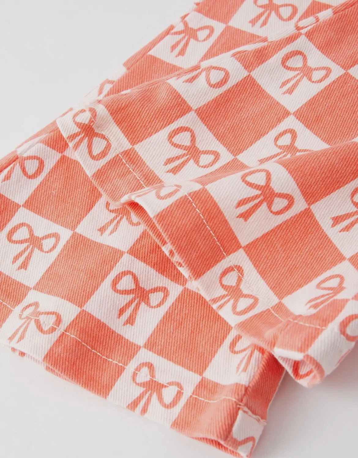 Girls Orange Bow Print Plaid Flares Jeans